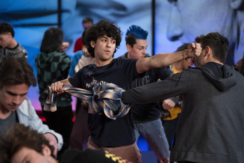 Cobra Kai. (L to R) Tanner Buchanan as Robby Keene, , Xolo Maridueña as Miguel Diaz, Jacob Bertrand as Eli 'Hawk' Moskowitz in episode 510 of Cobra Kai. Cr. Curtis Bonds Baker/Netflix © 2022