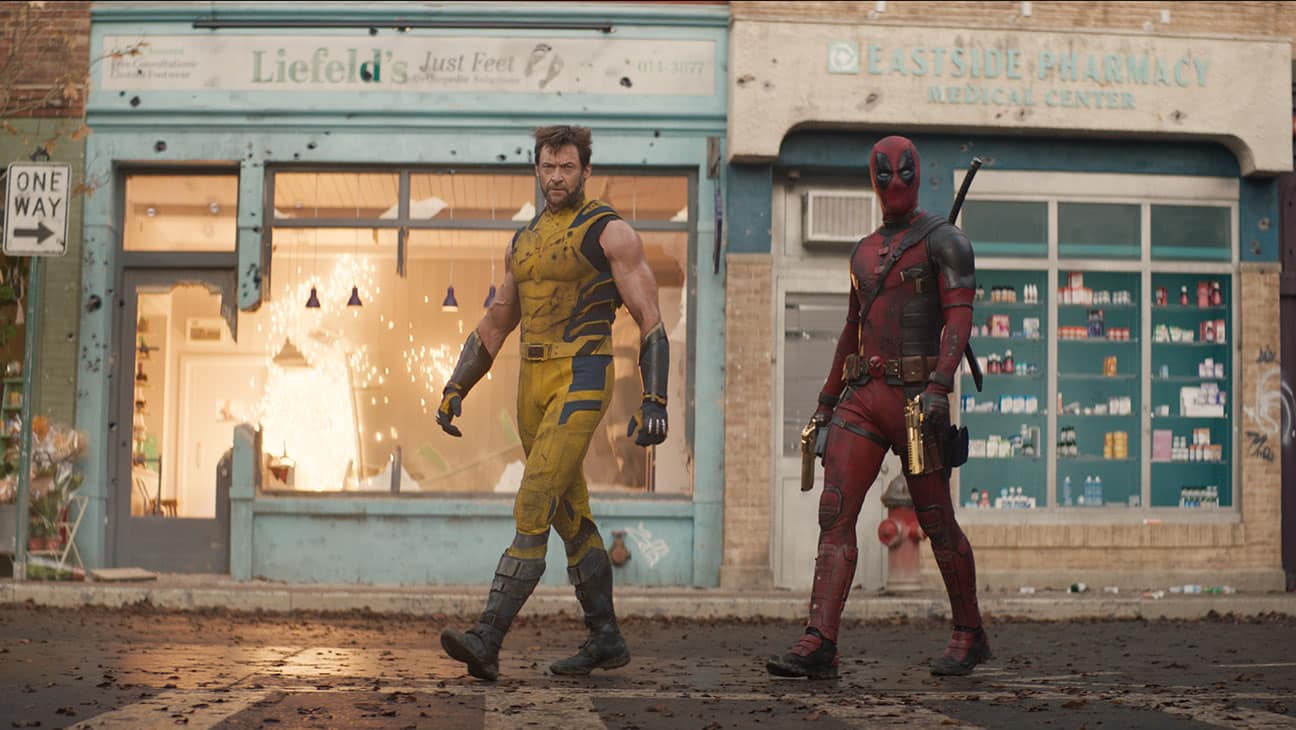 Hugh Jackman as Wolverine and Ryan Reynolds as Deadpool