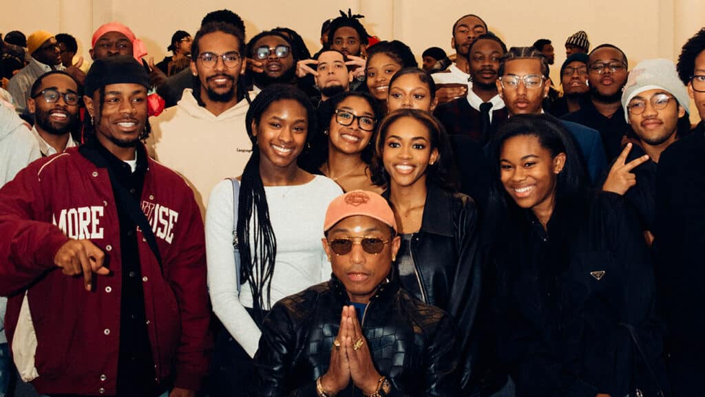 Pharrell Williams with Morehouse students who attended the premiere of his new short film, All Day I Dream About Sport A Film By Pharrell Williams and Gabriel Mose, presented by adidas