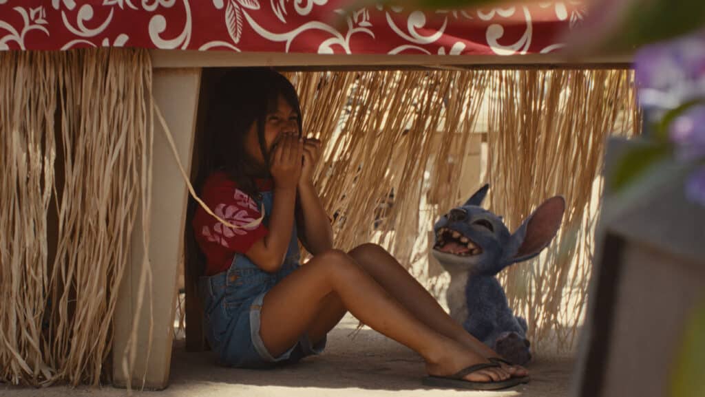 (L-R) Maia Kealoha as Lilo and Stitch in Disney’s live-action Lilo and Stitch