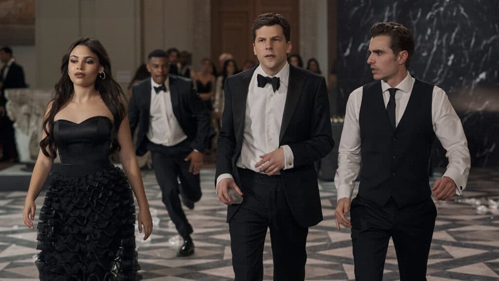 Ariana Greenblatt as June, Jesse Eisenberg as Daniel Atlas, and Dave Franco as Jack Wilder in Now You See Me: Now You Don’t.
